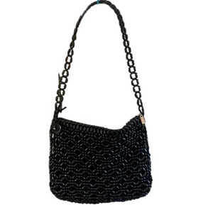 The Sak black wooden beaded shoulder strap purse.
